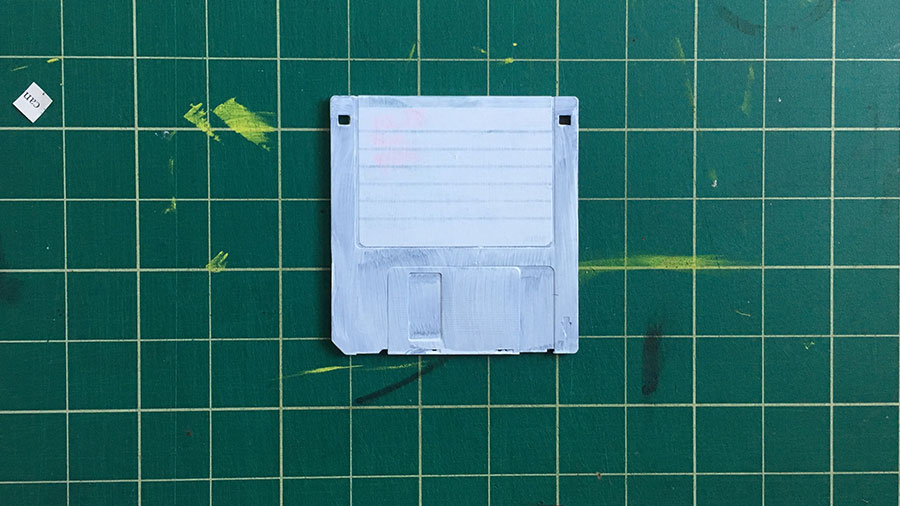 small acrylic paintings on old 3.5 inch floppy disks