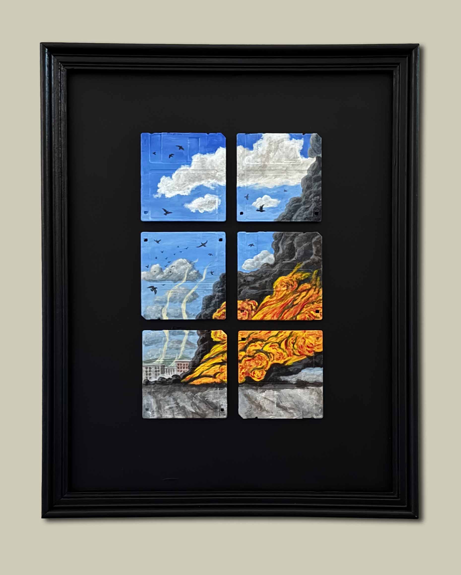 6 painted floppy disks forming an image of black smoke and fire.